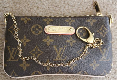 louis vuitton wristlet fake|louis vuitton wristlet for women.